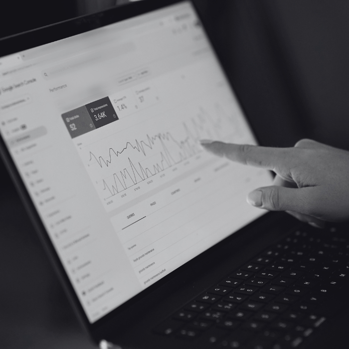 About us picture of laptop with website analytics on